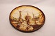 Large round 
ceramic dish in 
dark and light 
brown colors 
signed C. Eden. 
The dish is in 
great ...