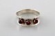 Bo Davidsson, Swedish silversmith. Modernist silver ring with red stones. Dated 
1962.