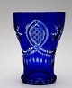 Bøhmisk 
krystal, Blå 
vase. Højde 
17,5 cm. 
Øverste 
diameter 12,5 
cm. Enkelte 
overfladeridser.
 ...