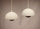 A pair of 
Flowerpot, 
model VP1, 
pendants in 
white designed 
by Verner 
Panton in 1968 
and ...