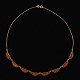 Støvring 
Design. 
Halskæde i 14k 
Guld.
Tegnet og 
udført hos 
Støvring Design 
- Denmark 1992 
- ...