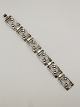 830 sølv art 
deco armlænke 
19 cm. hånd 
arbejde fra 
sølv smed E 
Arvid København 
 Nr. 362155