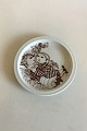 Bjorn Wiinblad, 
Nymolle Plate 
"The Luncheon 
on the Grass" 
No 3594. 
Measures 20 cm 
/ 7 7/8 in.