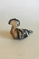 Royal 
Copenhagen 
Figur Hærfugl 
No 4746. Måler 
12 cm x 17 cm 
og er designet 
af Jeanne Grut.