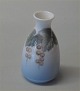 1220-1261 Kgl. 
Miniature Vase 
7 x 4 cm  fra  
Royal 
Copenhagen I 
hel og fin 
stand
