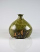 Vase i keramik 
med glasur i 
grønne nuancer
Signatur 
kender vi ikke.
Vase, keramik, 
...