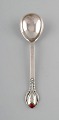 Evald Nielsen number 3, jam/marmelade spoon in hammered silver with cabochon 
coral bead. 1920