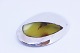 Brooch of 
silver and 
amber.
6 x 4 cm.