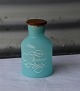 Lyseblå 
glaskrukke, med 
teaklåg, til 
badesalt
Design Ukendt
Mål  H.: 12cm  
...