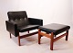 The easy Chair, 
model 6523, 
with 
accompanying 
stool, model 
6423, is an 
example of 
Danish ...