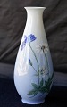 Royal 
Copenhagen, 
vase nr. 
2917/4056. 
Motivet er blå 
og hvide 
blomster
Design Royal 
...