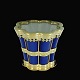 Royal 
Copenhagen. 
Margrethe Cup. 
Blue Porcelain 
with Gilded 
Sterling Silver 
Mounting. ...