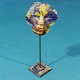 Maske i farvet 
glas og jern af 
Sven Holst 
Pedersen, 42 cm 
høj