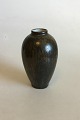Royal 
Copenhagen Vase 
med glasur i 
brune nuancer. 
Designet af 
Carl Frederik 
Ludvigsen. 
Mærket ...