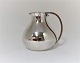 Hans Hansen. Silver Jug. Sterling (925). Model 106. Height 11 cm. Produced in 
1959