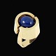 Ole Lynggaard. 
Ring i 14k guld 
med Lapis 
Lazuli.
Tegnet og 
udført hos Ole 
Lynggaard, ...