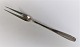 Ascot 
sølvbestik. 
Horsens 
sølvvarefabrik. 
Sterling (925). 
Stegegaffel. 
Længde 21 cm.