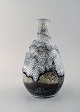 Svend Hammershøi for Kähler, Denmark. Vase in glazed stoneware. Beautiful gray 
black double glaze. 1930