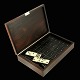 Hans Hansen. 
Rio Rosewood & 
Sterling Silver 
boxed Domino 
Set - 1960s
Rosewood Box 
with inlaid ...