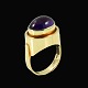 Just Andersen. 
Ring i 14k guld 
med ametyst. 
1960erne.
Tegnet og 
udført hos Ib 
Just Andersen 
...