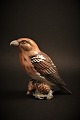 Dahl Jensen 
porcelæns figur 
af fugl , 
Korsnæb. H:10,5 
cm.
Dekorations 
nummer: 1356. 
1.sort.
I ...