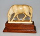A horse,, 
ivory, 
sculpture, 
approx. 1900