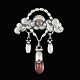 Evald Nielsen 
1879 - 1958. 
Art Nouveau 
Silver Brooch 
with Lilac 
Quartz
Designed and 
crafted by ...