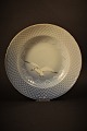 Bing & Grøndahl 
dyb tallerken i 
Mågestel med 
guldkant.
Dekorations 
nummer:23. 
Dia.:21cm. 
 I ...