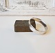 Kraftig armring 
i massivt 
sterlingsølv
Stemplet: SPS 
- 925
Diameter 7,2 
cm. Bredde 15 
mm.
