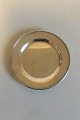 Georg Jensen 
Sterling Sølv 
Tallerken No 
210 H. Måler 15 
cm. Vægt 126 
gram
Designet af 
Georg Jensen