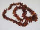 Long necklace with many pieces of Danish amber