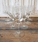 Set of 12 white 
wine glasses 
decorated with 
guilloche  
Height 17 cm.