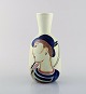 Carl-Harry 
Stålhane for 
Rörstrand/Rørstrand.
 Vase i 
glaseret 
keramik. 
Håndmalet bonde 
motiv. ...