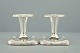 M. Gudmundsen & 
Søn lysestager. 

M. Gudmundsen 
& Søn; Par små 
lysestager af 
sølv, h. 5,8 
cm. ...