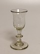 Snap glass with 
bell-shaped 
bowl Holmegaard 
cat. 1853 H. 
10.4cm. air 
bubbles appear 
in the glass 
...