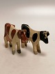 Sort og brun 
broget køer 
Fængsel 
legetøj
Fremstår med 
brugsspor
H.6cm L.7,5cm.