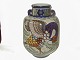 Kollosal 
Aluminia Vase 
med Påfugl 
Dekoration.
Den har nummer 
#553/#348.
Vasen er meget 
...