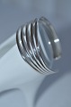 Armring af  
sterling sølv 
925. Bredde 2,7 
mm. 
Inderdiameter 6 
cm. Vægt 31 
gram. Stemplet 
...
