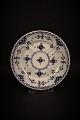 Royal Copenhagen Blue Fluted half-lace cake / side dish. Dia.:14,5cm.
RC# 1/653.