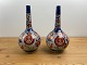 Couple Meiji 
period 
long-necked 
Japanese vases. 
Approximately 
1900. Very 
beautiful with 
a ...