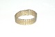Elegant v 
mønster armbånd 
i 14 karat guld