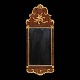 A gilt mahogany 
and walnut 
mirror. Denmark 
circa 1770. ...