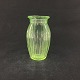 Højde 11,8 cm.
Sjælden 
urangrøn 
presseglas vase 
fra Holmegaard 
købes omgående.
Den er vist i 
...