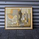 Litografi af 
flaske mm på 
bord, i ramme 
og glas. 
Signeret HE 
61/90 
Kunstner: 
Helge ...