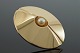 Hans Hansen 
smykke. 
Hans Hansen; 
Oval broche af 
14 kt. guld med 
perle #107. 
Oval facon, 5 
cm ...