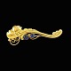 Georg Jensen 
Broche i 18k 
guld med 
syntetiske 
safirer #36. 
1933-1944 
stempler.
Tegnet af 
Georg ...