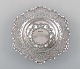 Charles Boyton 
& Son, London. 
Pierced 
ornamental bowl 
in silver. 
1910's.
Stamped.
In very good 
...