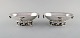 A pair of rare 
Georg Jensen 
jardiniere in 
sterling ...