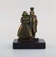 J. Frödiig, 
svensk 
billedhugger. 
Bronzeskulptur 
på marmorbase. 
Midt 
1900-tallet.  
Måler: 13,5 
...