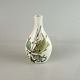 Oval Diana vase 
i fajance med 
motiv af fisk 
nr. 1046/5144
Design af Nils 
Thorsson
Produceret ...